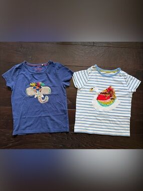 2 Mini Boden Tees with sequencing appliqué